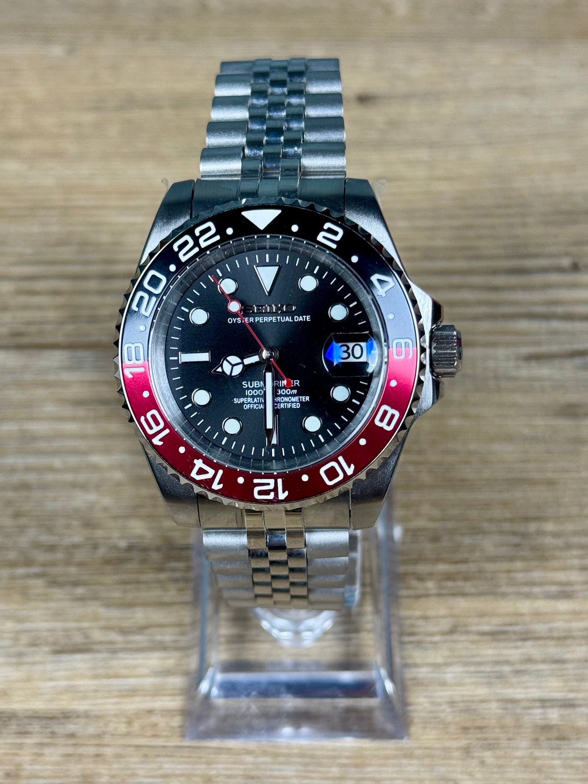 LGT Coke – Montre automatique NH35 – Cadran noir – Lunette noire et rouge – Bracelet Jubilee en acier inoxydable